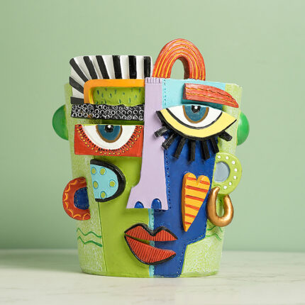 Cubist-Style Abstract Face Planter with Geometric Shapes - Colorful Resin Flower Pot for Succulents & Indoor Plants. Picasso-Inspired Modern Art Decor with Stripes, Polka Dots, and Red Lips Design.