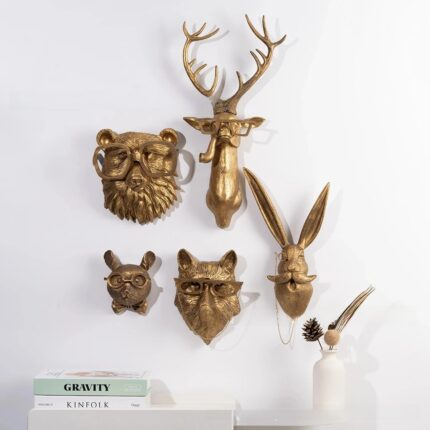 Gold Animal Head Wall Decor with Vintage Glasses & Bow Ties, White Background with Books and Dried Flowers